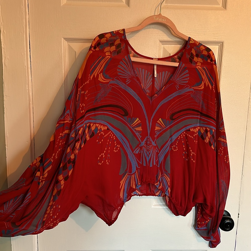 Free People sheer, vibrant v-neck blouse. - Picture 2 of 4